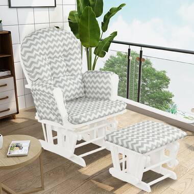 White glider rocker with gray outlet cushions